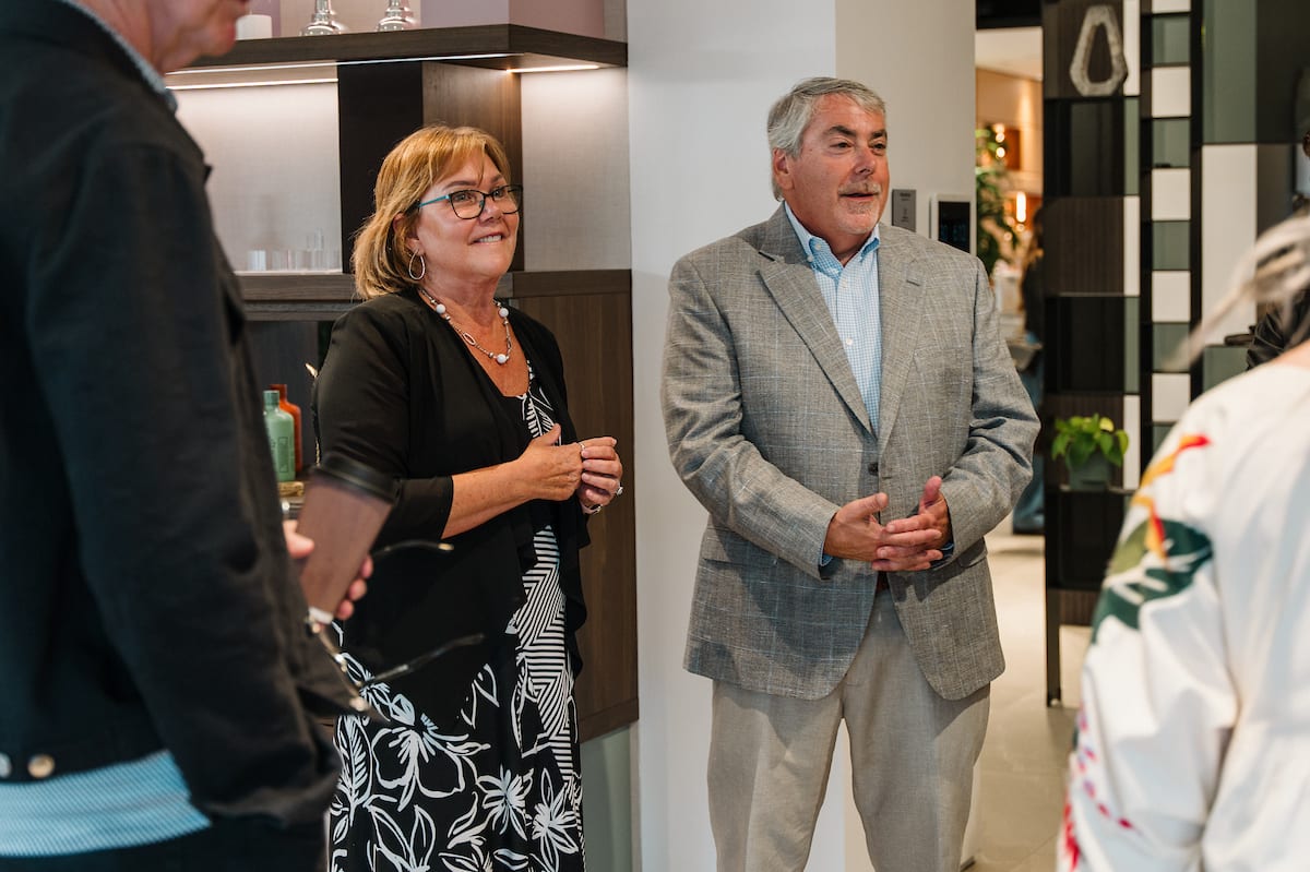 sandra and michael soltoff, eggersmann usa owners, speaking to the attendees at a tequla tasting event at the eggersmann laguna showr