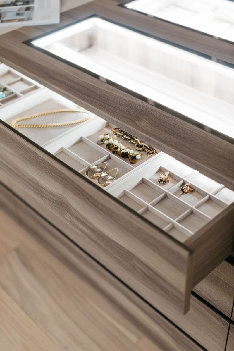 interior LED lighting in a jewelry caase in a luxury walk-in closet designed by eggersmann