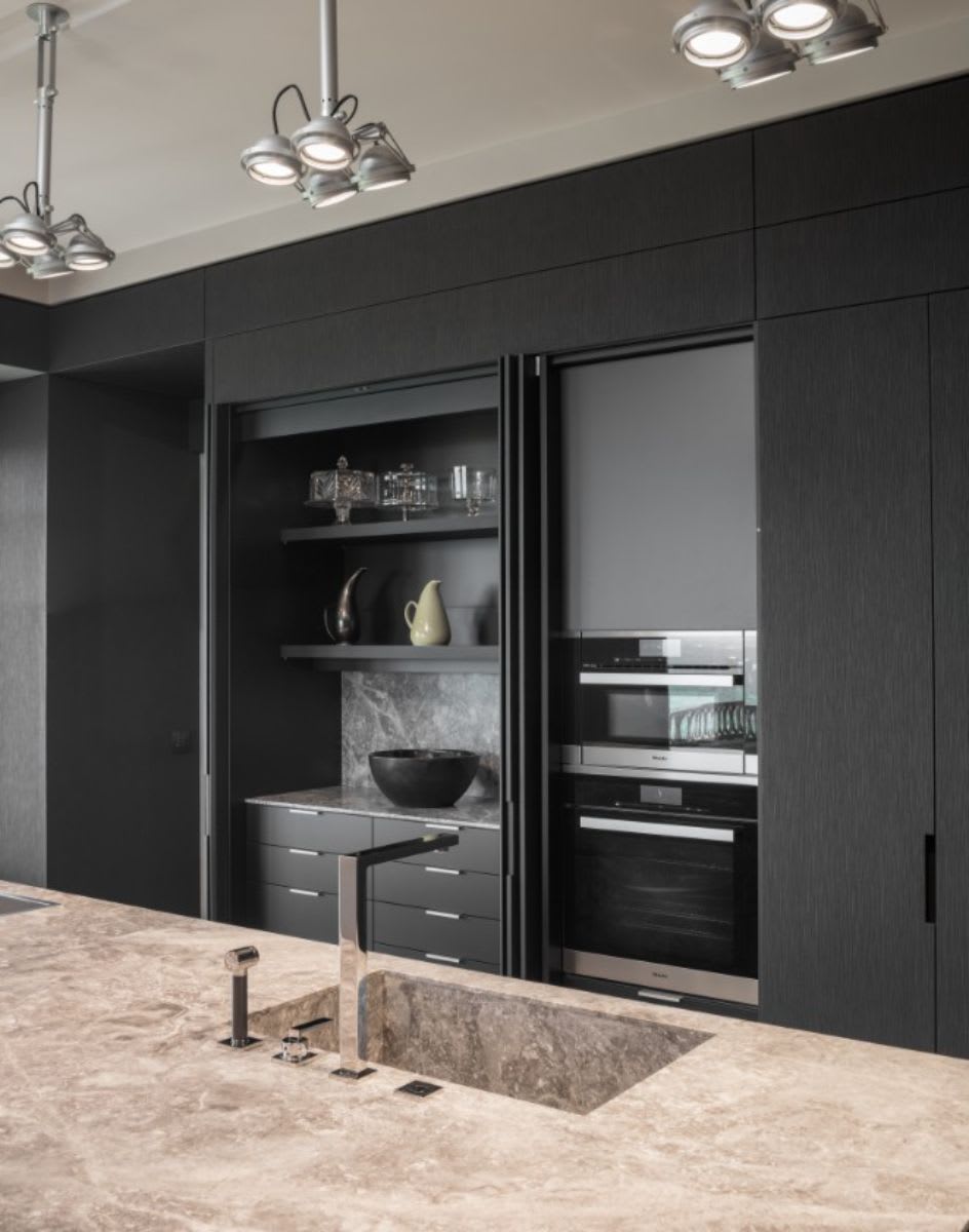 pocket doors Reveal prep area, storage, and ovens when opened