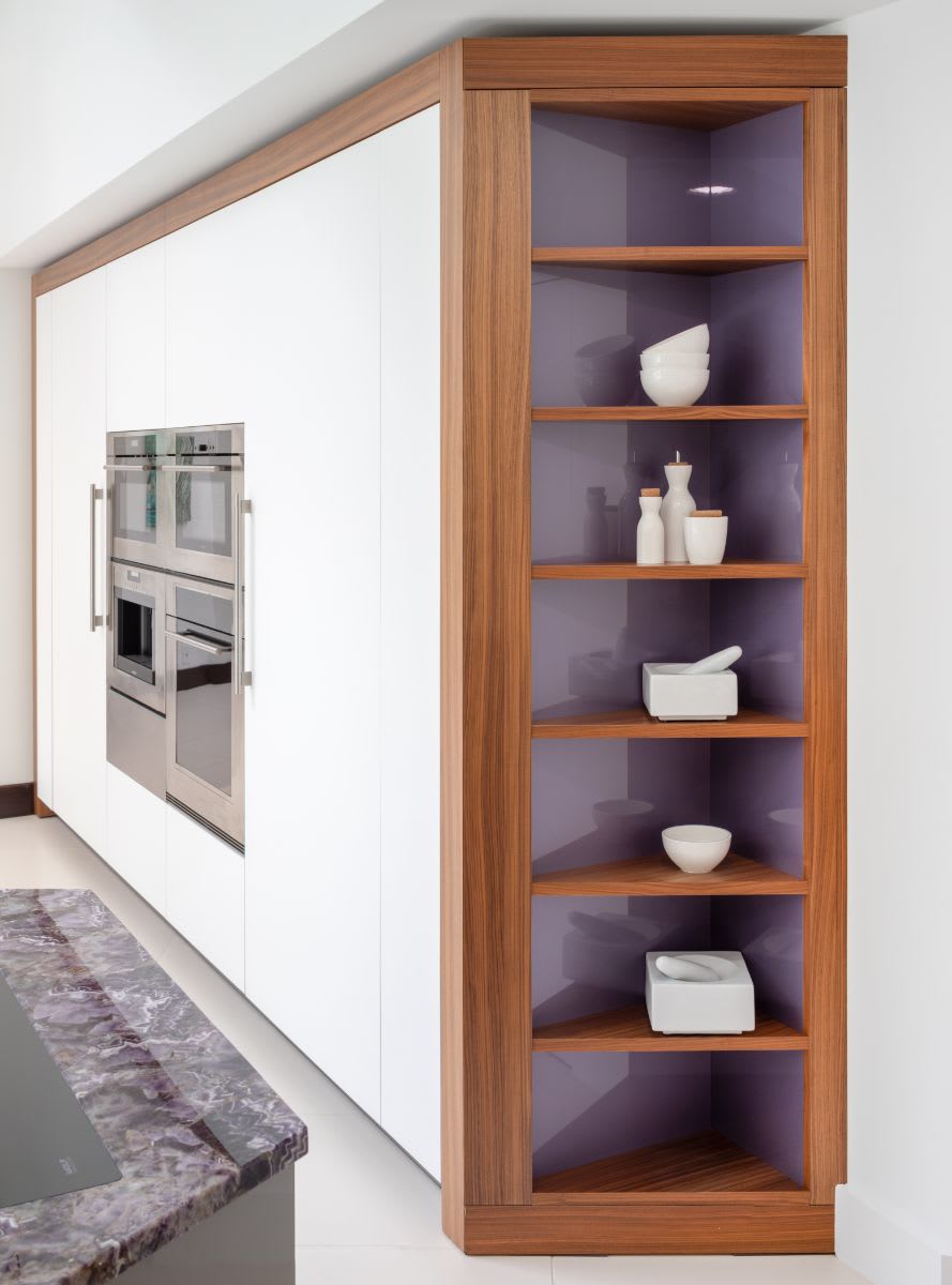 eggersmann-designed display case featuring a very peri-colored paint on the back to coordinate with the island stone