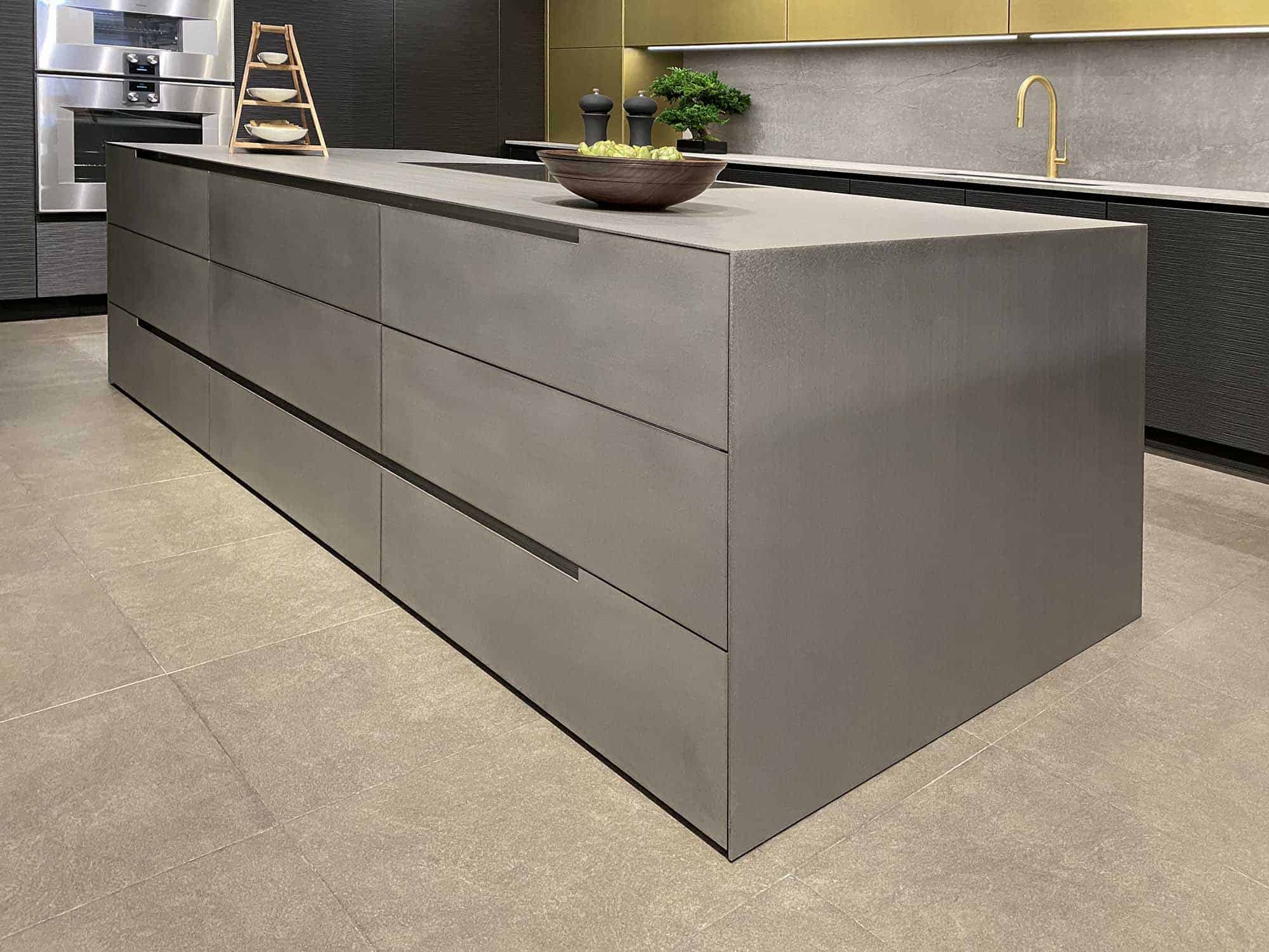 kitchen island in silver touch hot rolled steed in a new kitchen display in the eggersman NYC showroom