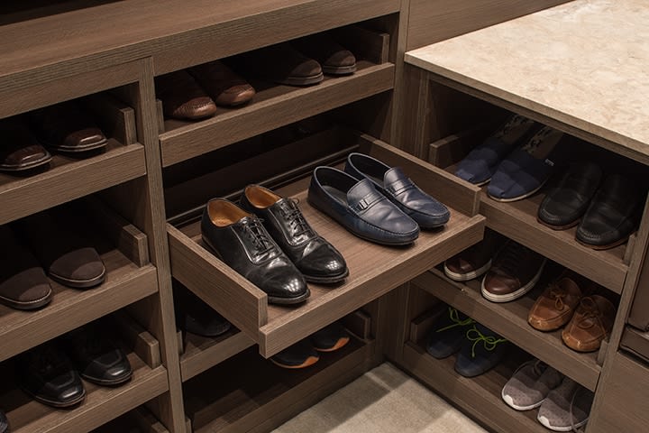 custom shoe trays in a Schmalenbach closet for him