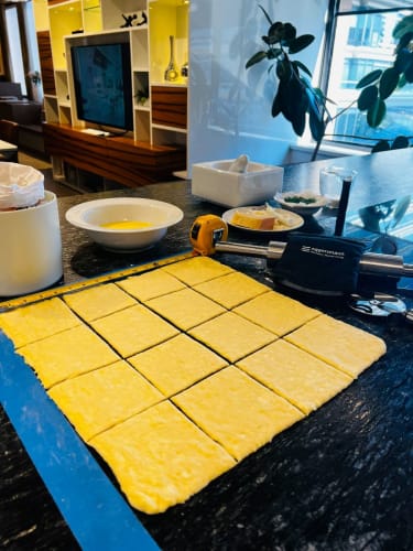 danish pastry dough cut into 16 squares