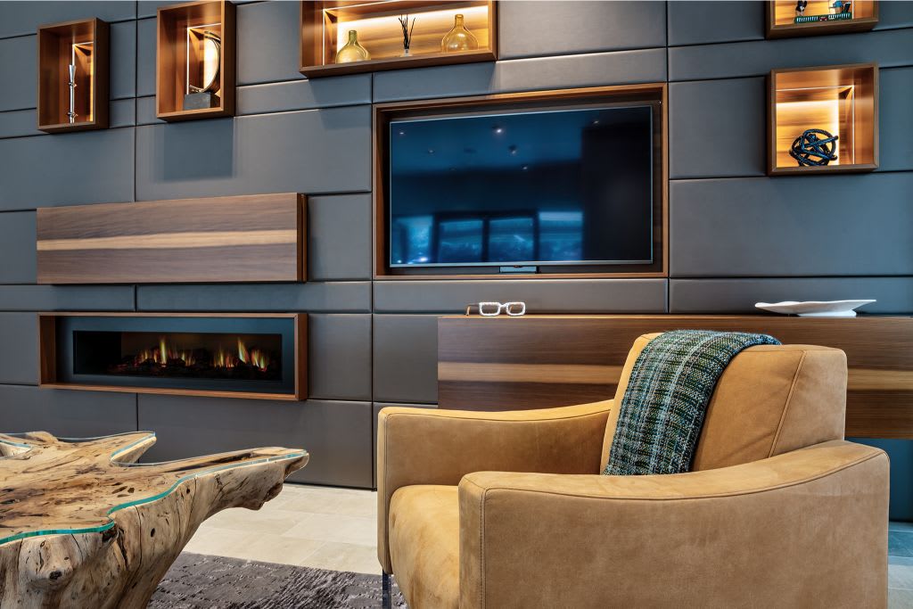 horizontal electric fireplace by dimplex installed in eggersmann desgined modular media wall