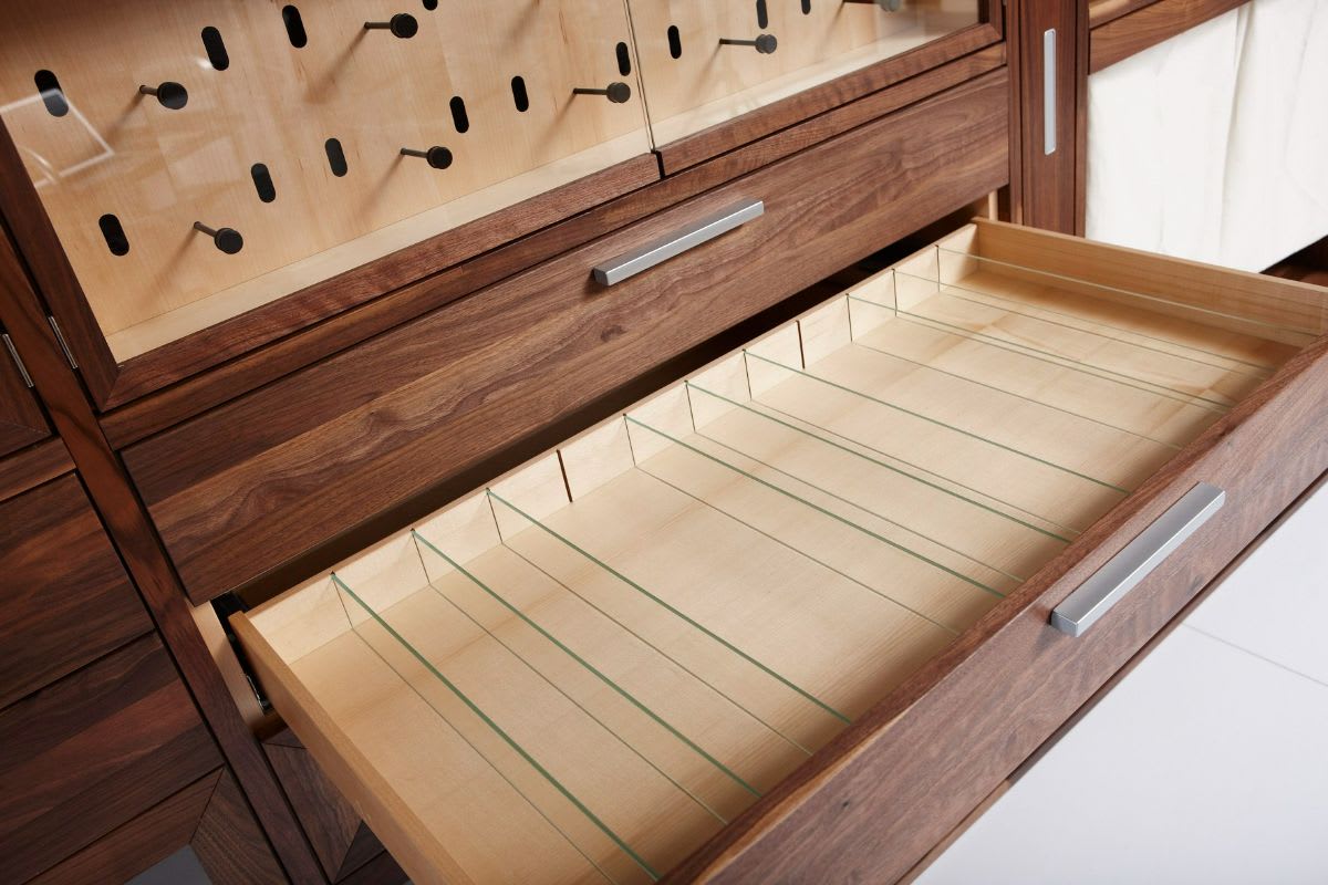 removable glass dividers in a german cabinet customized for a wardrobe