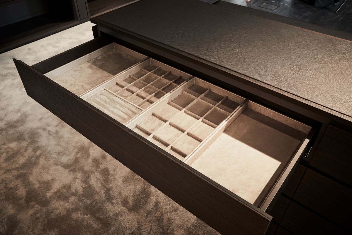 custom luxury jewelry organizers for schmalenbach cabinetry in an eggersmann-designed walk-in closet