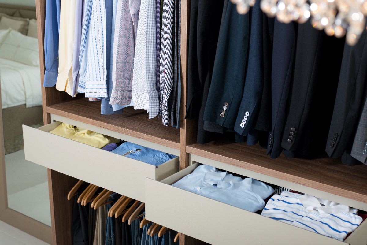 sleek drawers between hanging clothes levels puts all your clothes in one easy location