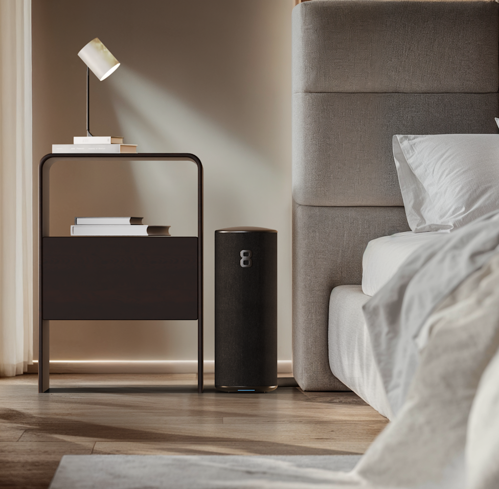 The Eight Sleep Pod 5 Ultra in a warmly lit room.