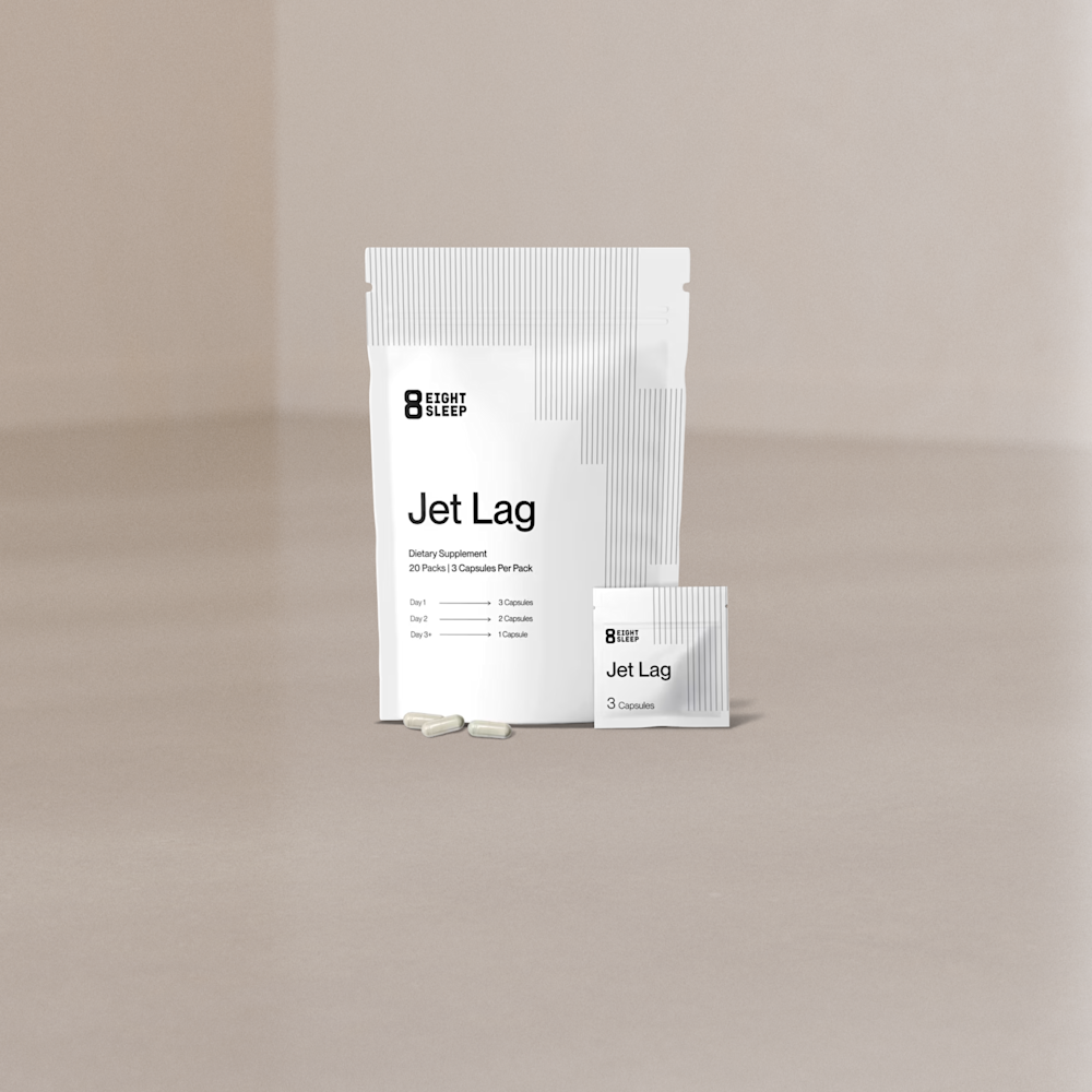 The Jet Lag supplement pouch and sachets on a studio floor.