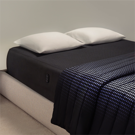A view of the Blanket on a bed actively cooling