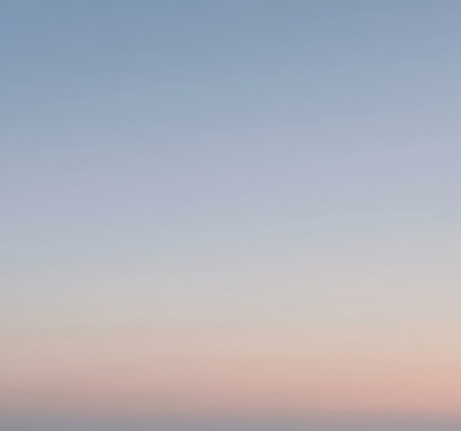 A soft blur of dawn light