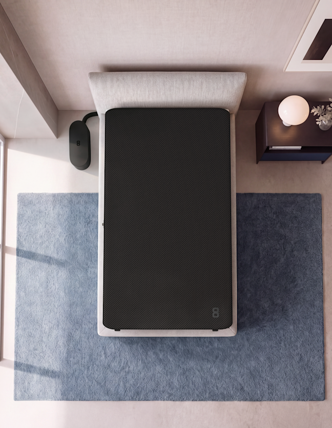 A Pod Cover on a twin bed in a small bedroom