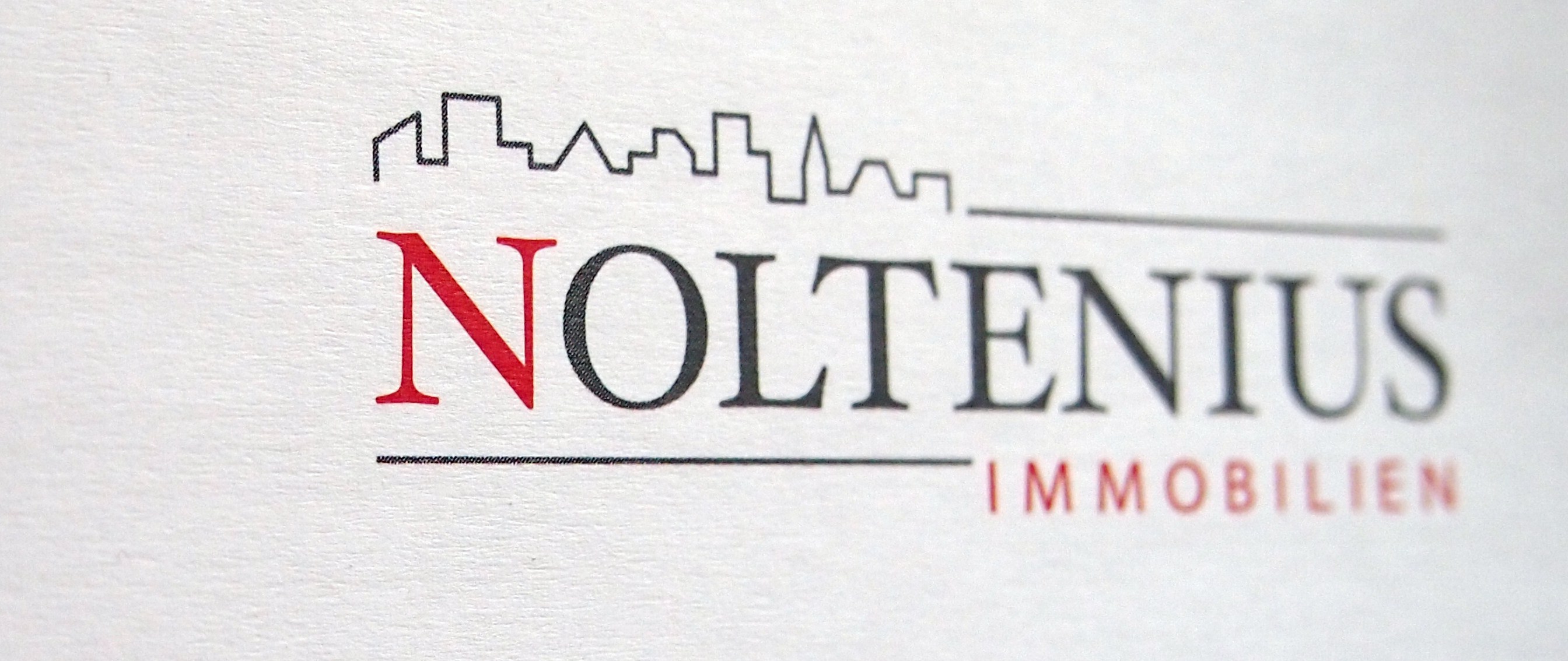 Hier sehen Sie das Logo von NOLTENIUS IMMOBILIEN