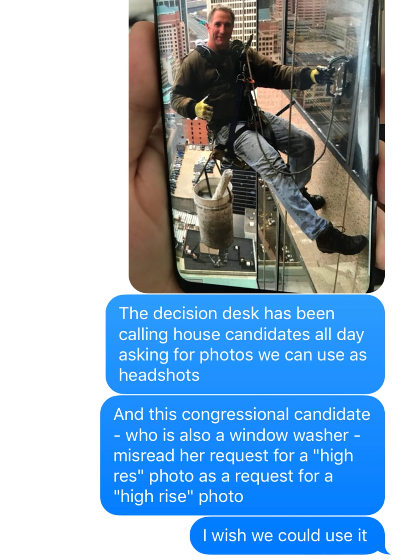 Man window washing on high-rise building misidentified as congressional candidate providing high-resolution headshot photo.
