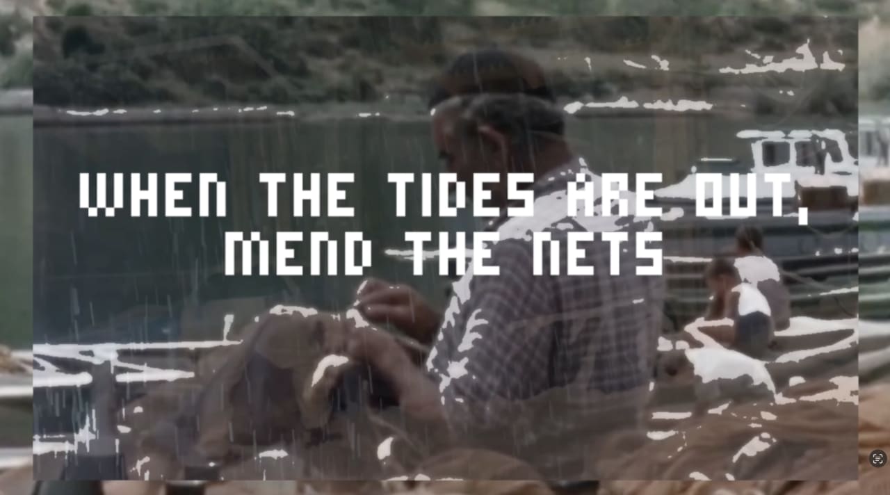 Meme about tire repair with text 'When the tires are out, mend the nets' overlaid on archival footage of people working. Meme about tire repair with text 'When the tires are out, mend the nets' overlaid on archival footage of people working.