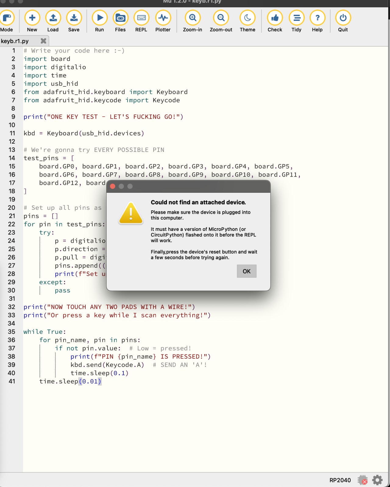 CircuitPython IDE showing keyboard input scanner code with error dialog indicating microcontroller device not found or needs firmware flashing.