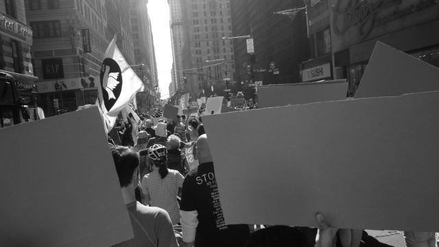 People and signs filled the New York streets on a hot September day