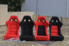 2 Red and Black Fiber Racing Bucket Seat.