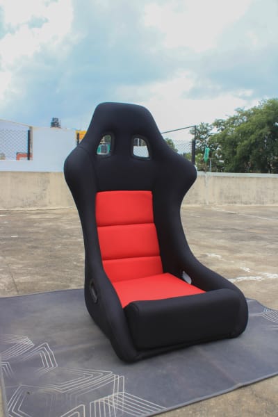 Black Fiber Racing Bucket Seat on a Wooden table.