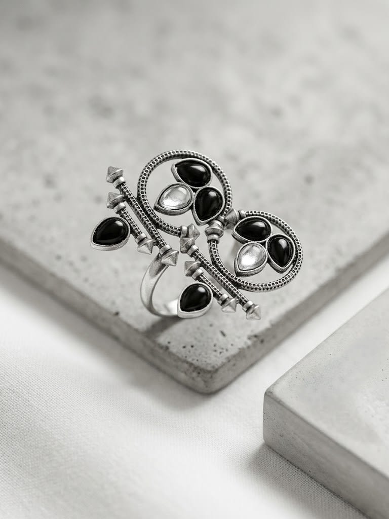 Silver-Toned Oxidized Jhumka Earrings with Black Stone Detailing