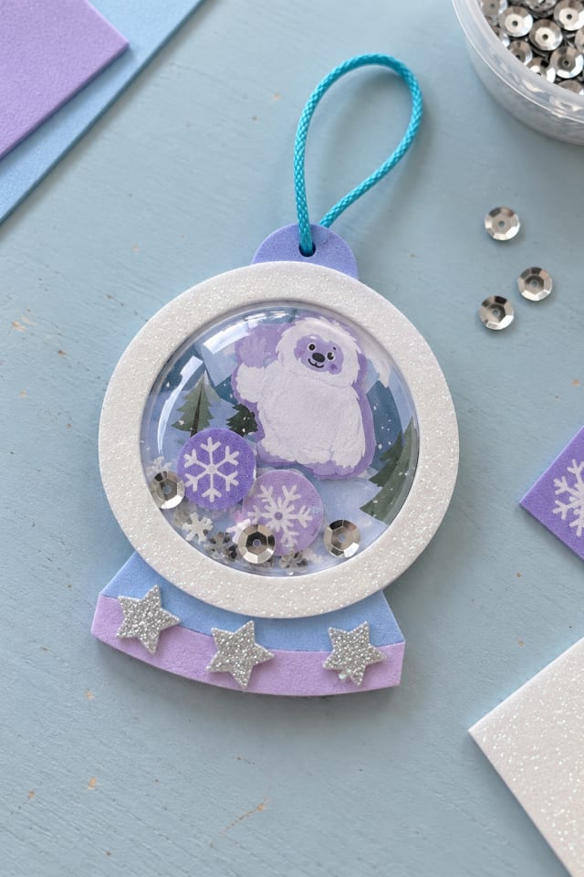 Shaker Snow Globe Ornament Kit with a Winter Yeti and Silver Sequins maker-lifestyle pin