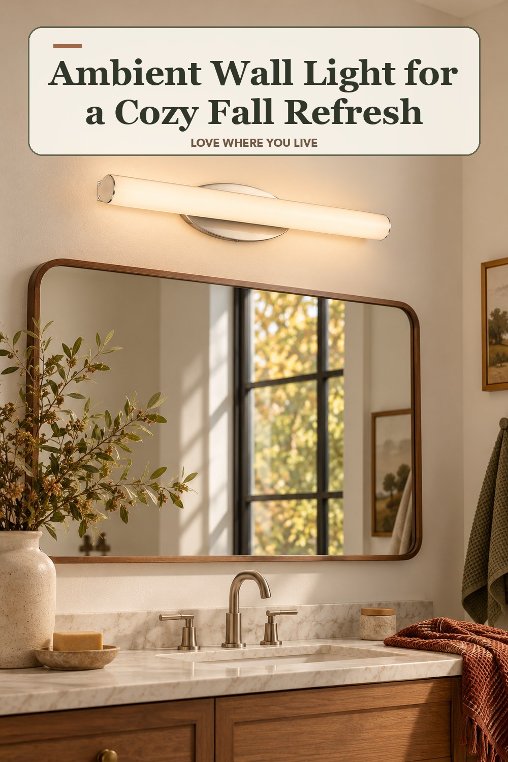 Lived-in fall room with a ambient wall light and the headline: Ambient Wall Light for a Cozy Fall Refresh.