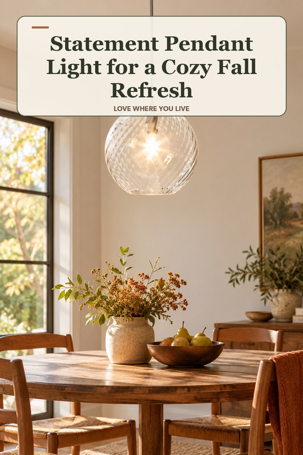 Lived-in fall room with a statement pendant light and the headline: Statement Pendant Light for a Cozy Fall Refresh.