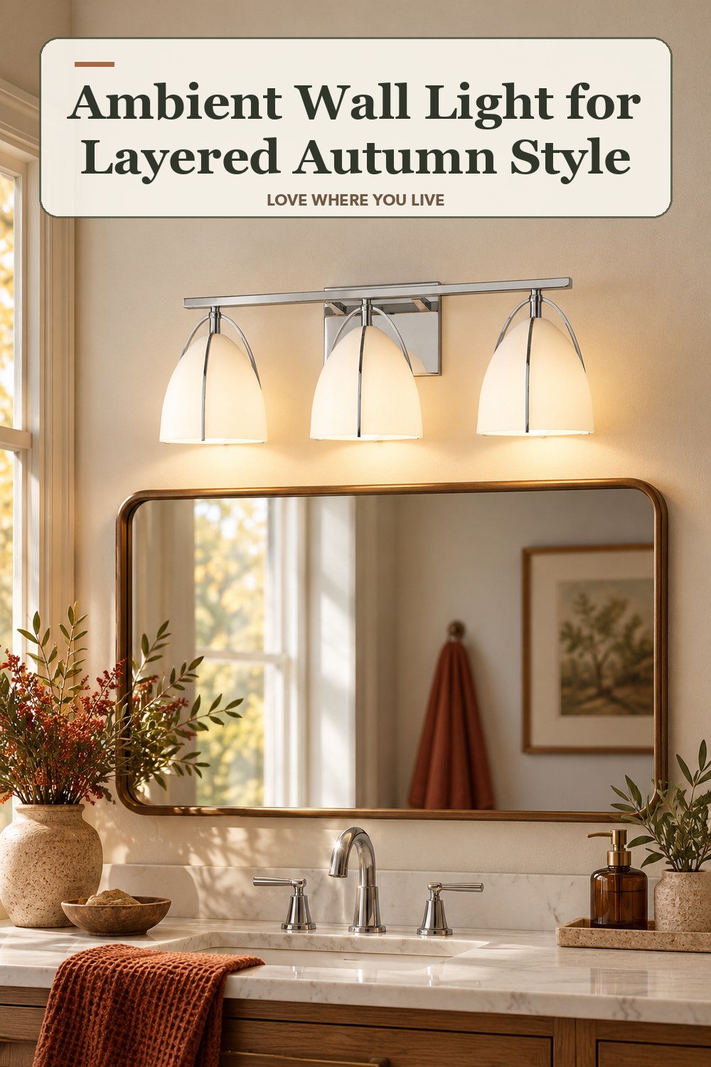 Lived-in fall room with a ambient wall light and the headline: Ambient Wall Light for Layered Autumn Style.