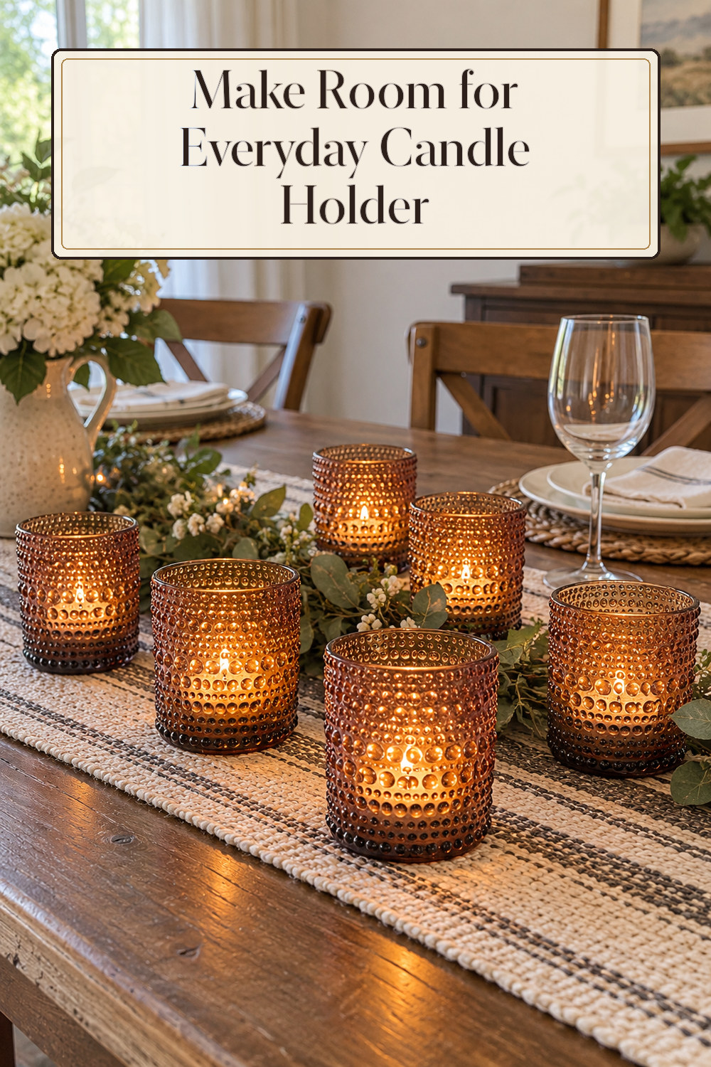 A realistic candle holder used naturally in a softly lit dining room at home.