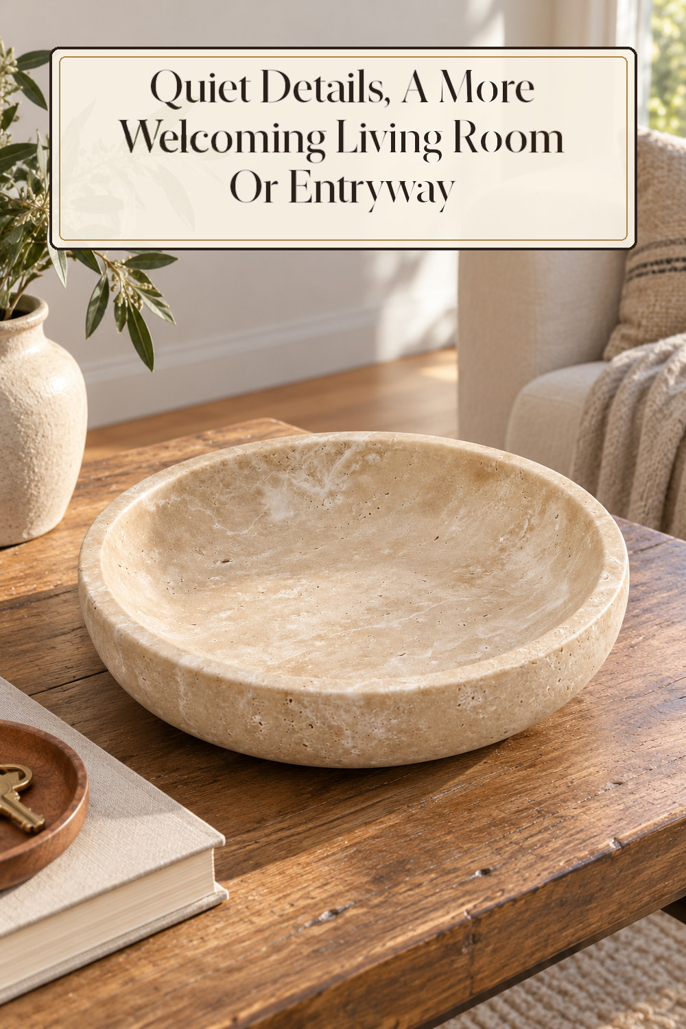 A realistic decorative bowl used naturally in a softly lit living room or entryway at home.