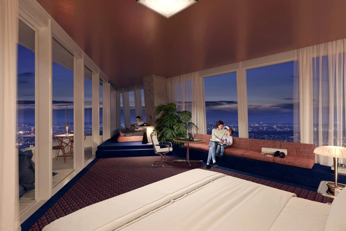 Suite Radisson Blu Torre Triangle París salón sofá vistas panorámicas de noche