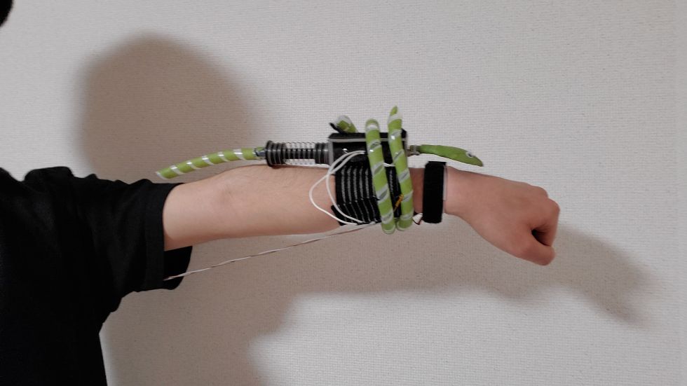 代わりにボタンを押してくれる装着型デバイス