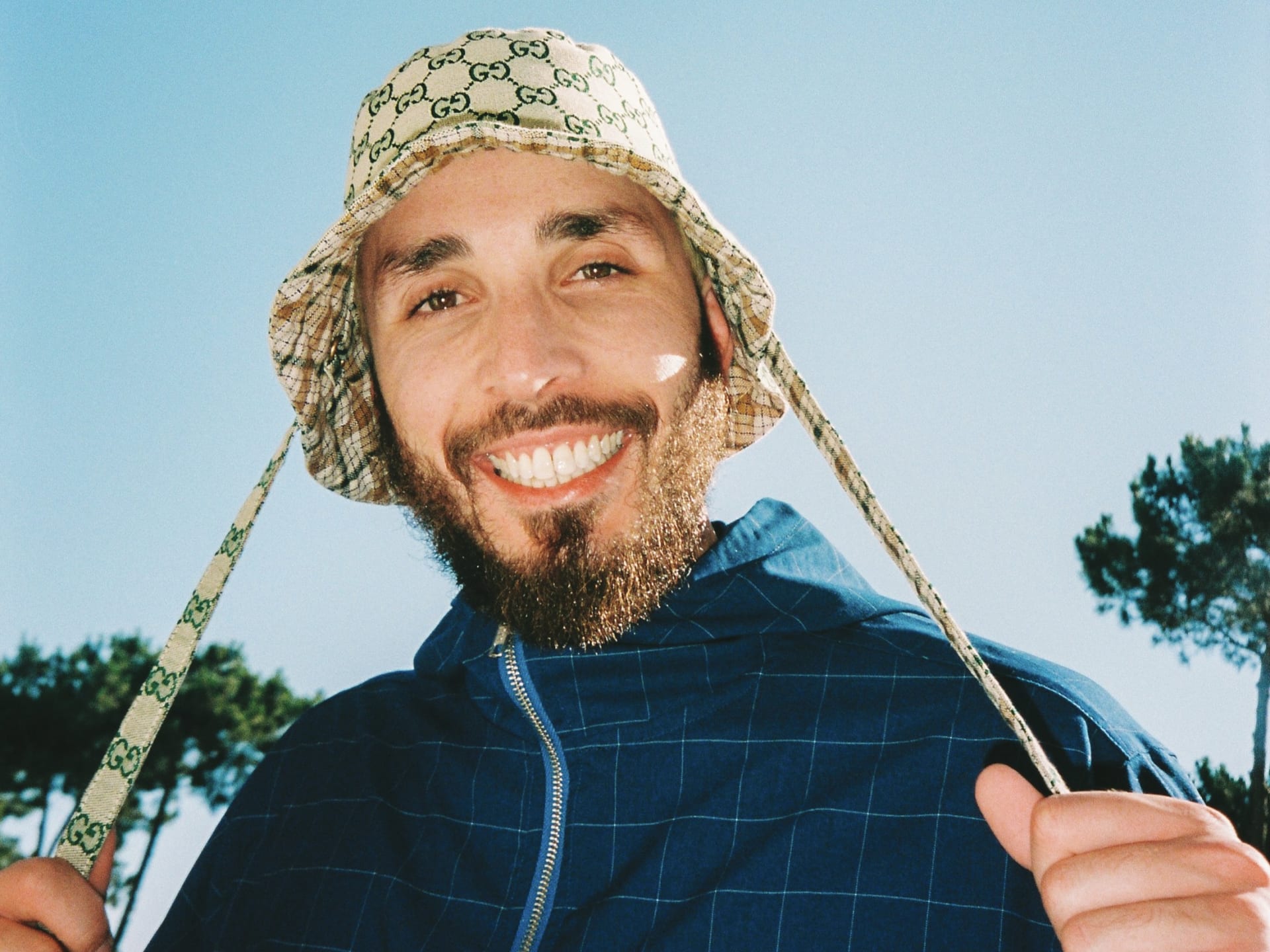 Folamour in his iconic Bucket Hat