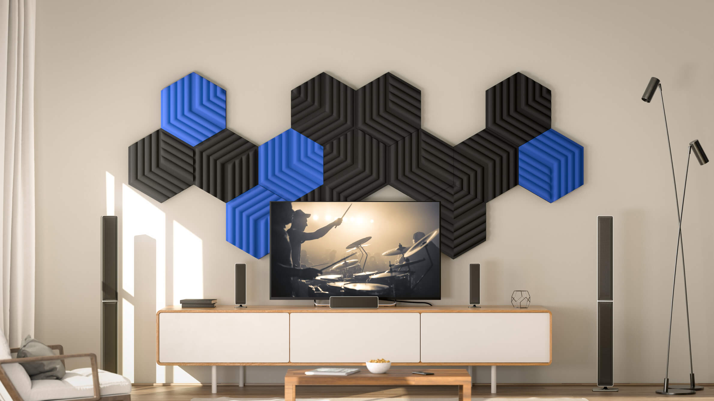 Home theatre in a living room with black and blue wave panels in the background wall
