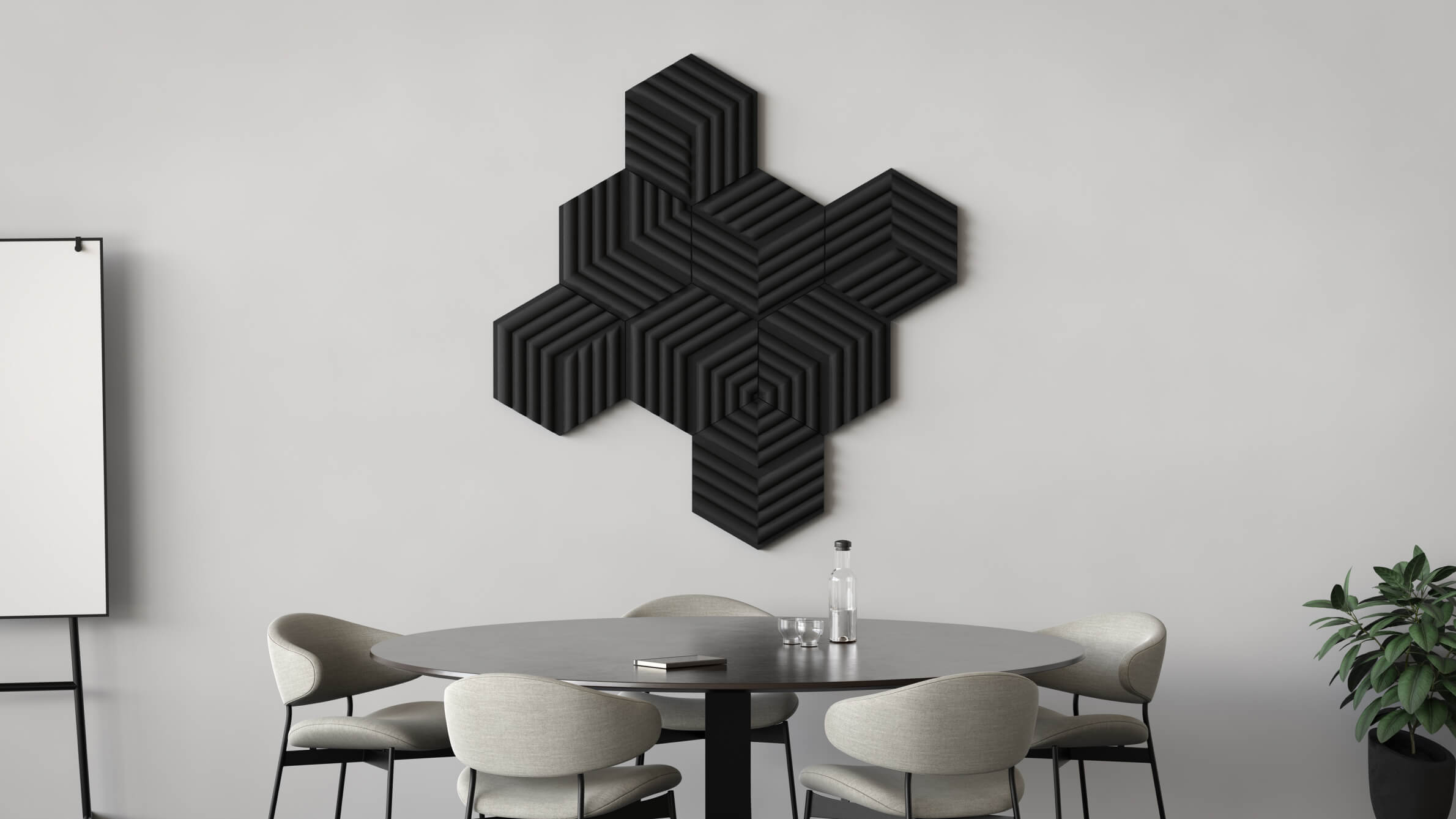 Office setup with black wave panels in the background wall