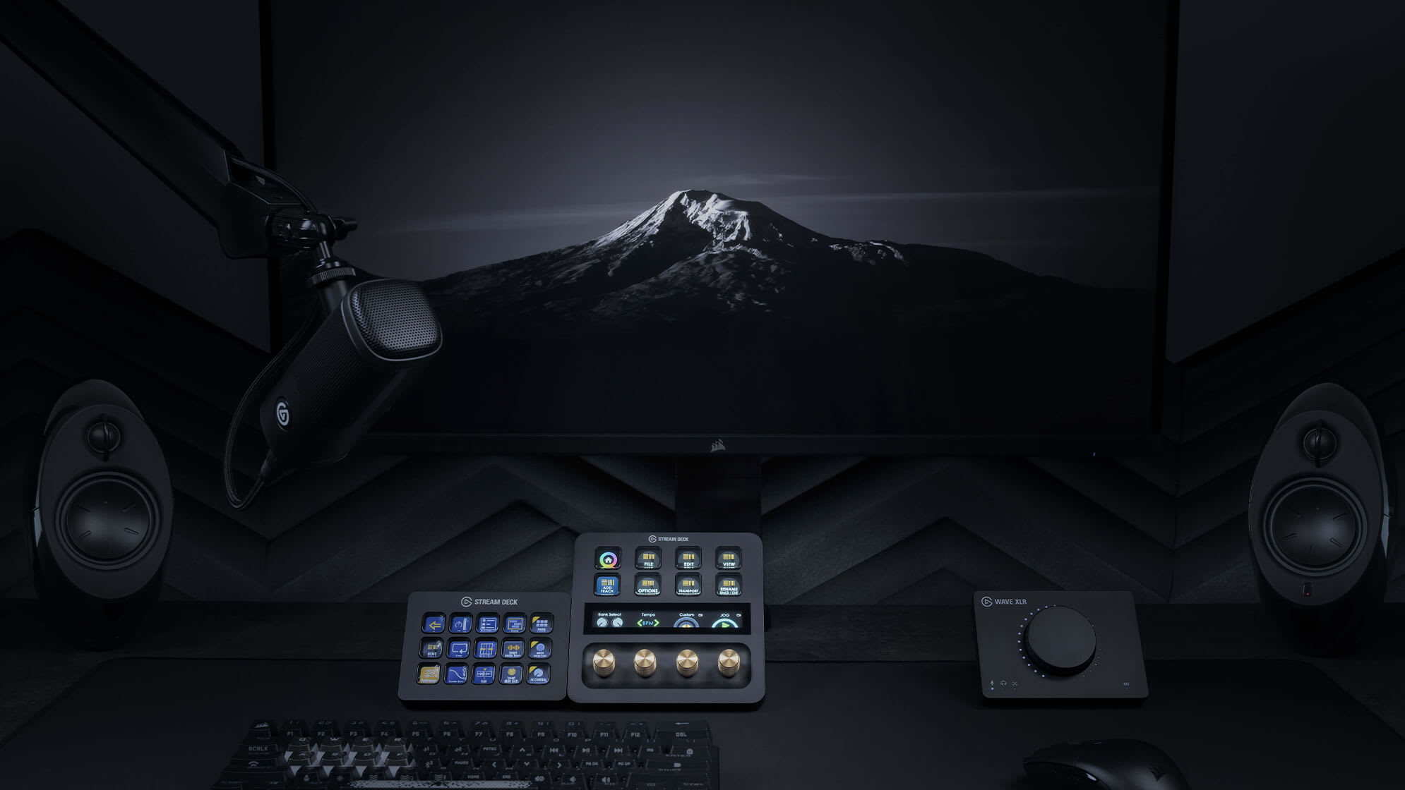 A creator setup in a dark environment with Stream Deck Plus and gold dias, Stream Deck MK.2, Wave XLR and Wave Dx