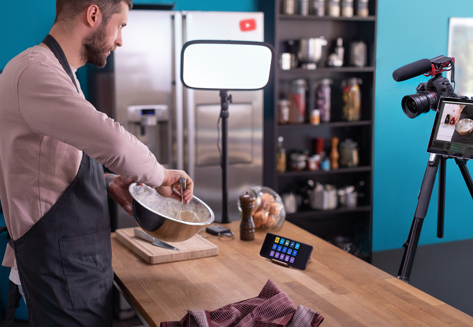 A streamer streaming about cooking and controlling the stream with the stream deck mobile