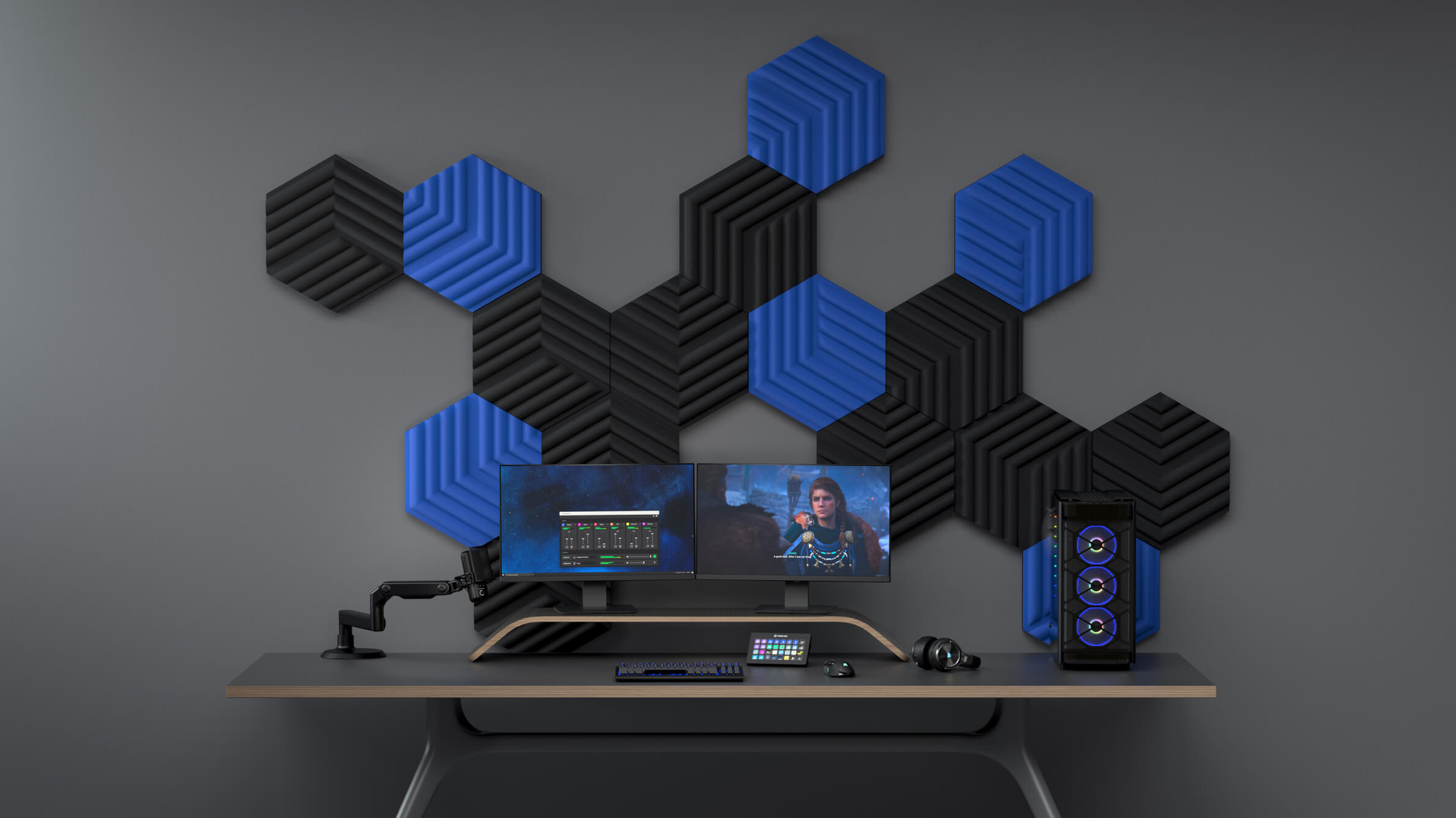 Streaming setup with black and blue wave panels in the background wall