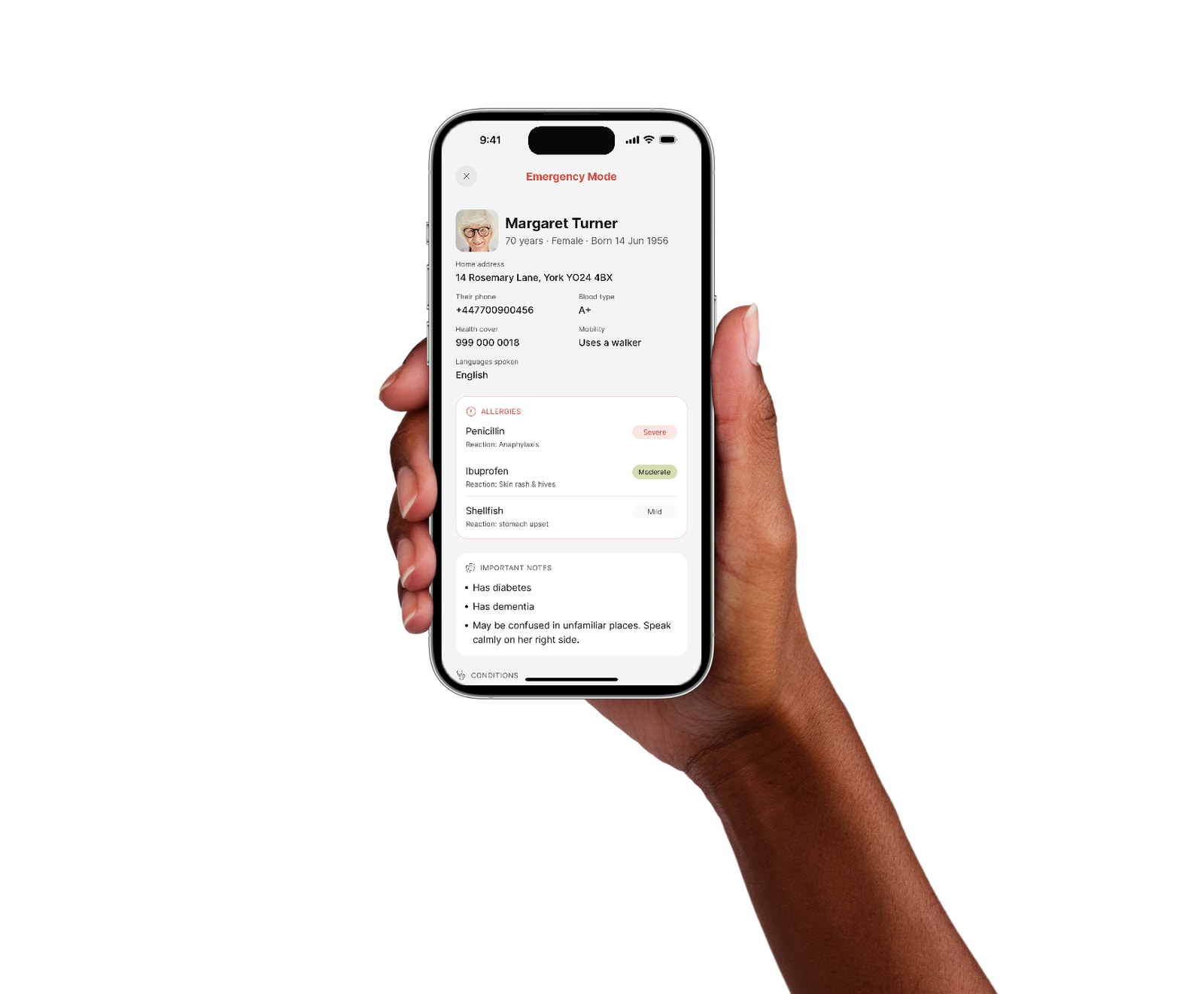Hand holding an iPhone with Kinlog in Emergency Mode, showing Margaret Turner's details, blood type A+, and allergies to penicillin, ibuprofen and shellfish