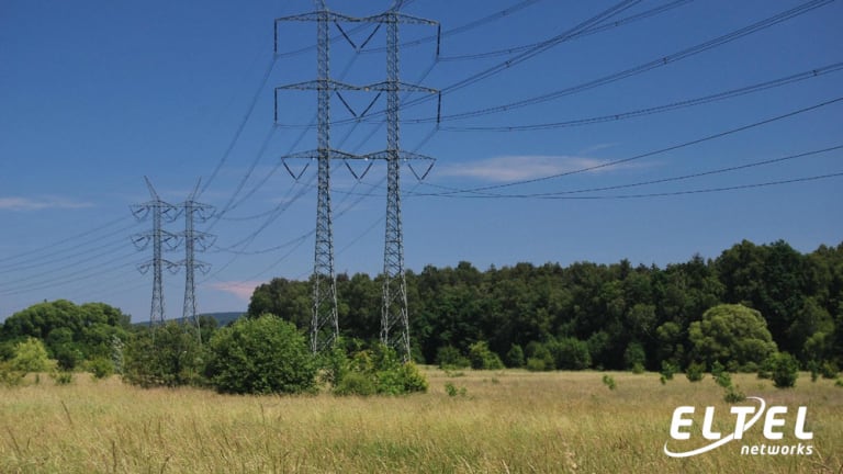 Transmission towers (suspension type) forming high voltage overhead line - eltelnetworks.pl