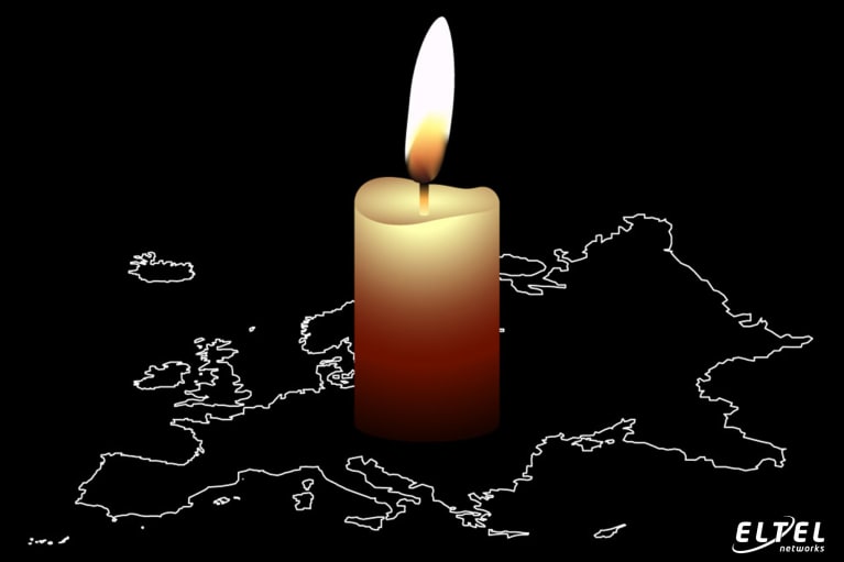 Symbol of the serious widespread blackout – a candle standing on the black map of Europe - eltelnetworks.pl