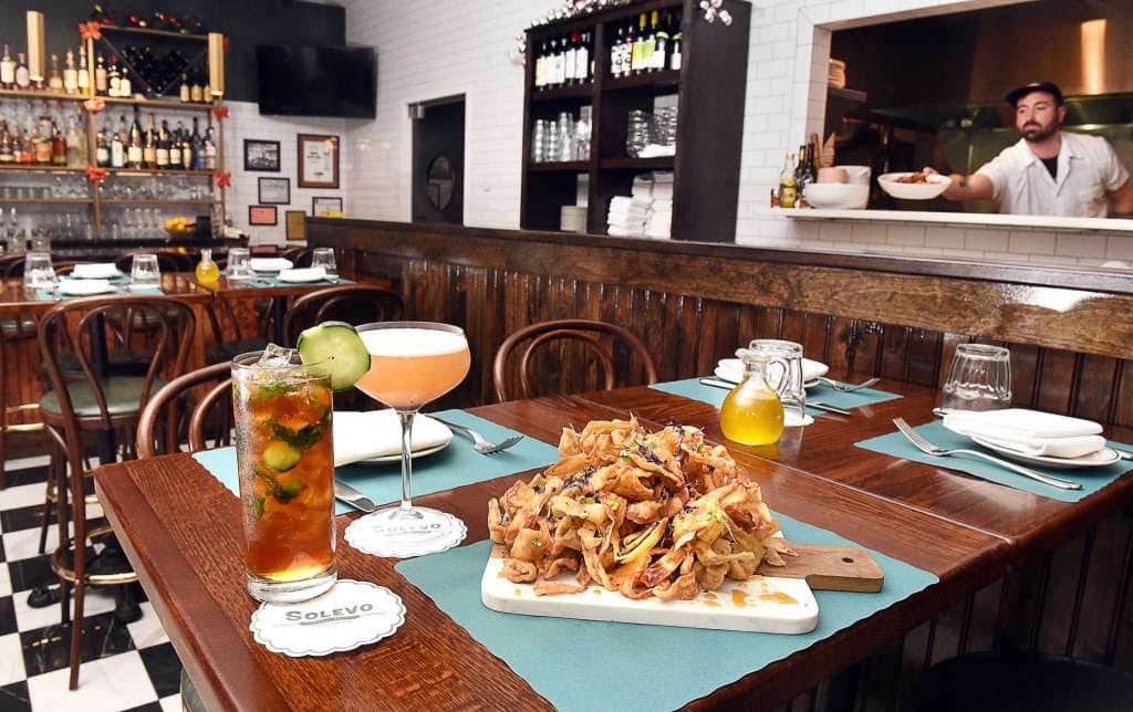 Solevo Kitchen + Social background image