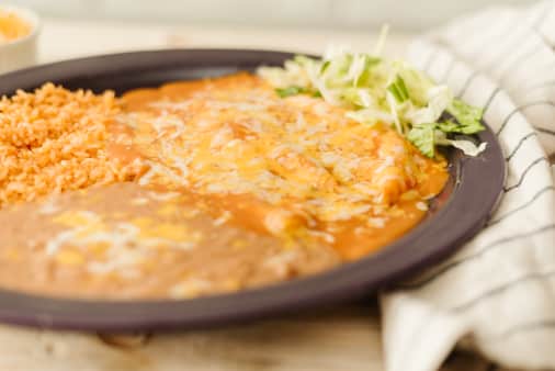image of #3 Two Cheese Enchiladas w/beans & rice