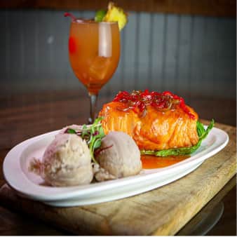 SALMON STUFFED WITH SHRIMP AND CREAM CHEESE IN A SWEET AND SOUR SAUCE