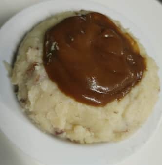 image of Garlic Mashed Potatoes w/ Mushroom Gravy