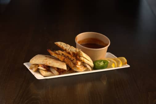 image of BBQ Brisket W/Grilled Onions and Provolone