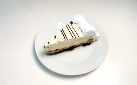 image of Gooey Decadent Brownie Cheesecake - Slice