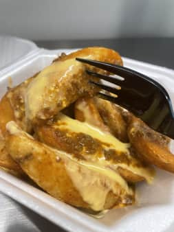 image of Potato Wedges with Chili & Cheese