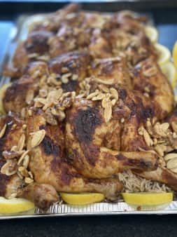 image of 69.99Chicken Legs/Thighs w/ Rice Half Tray