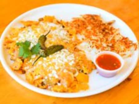 image of Migas Cuatro Quesos